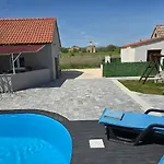 Grey House With Heated Pool Drnis Holiday home