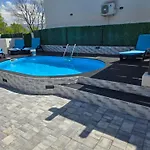 Grey House With Heated Pool Drnis