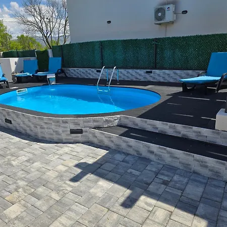 Grey House With Heated Pool