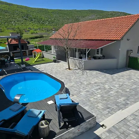 Grey House With Heated Pool Drnis Holiday home *