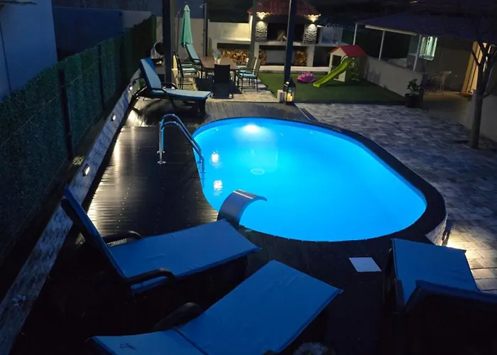 Grey House With Heated Pool Drnis Holiday home *